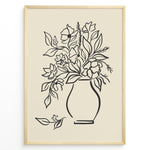 Load image into Gallery viewer, Minimalist black and white floral vase line art print plakat with botanical design in a black frame on beige background
