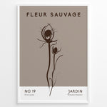 Load image into Gallery viewer, Framed “Fleur Sauvage No.19” poster with minimalist brown wildflower line art on a taupe background, from the Jardin Minimalist Collection.
