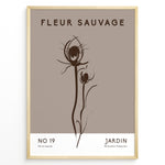 Load image into Gallery viewer, Framed “Fleur Sauvage No.19” poster with minimalist brown wildflower line art on a taupe background, from the Jardin Minimalist Collection.
