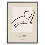 Load image into Gallery viewer, Framed “La Femme No.07” poster with minimalist brown line art of a reclining female silhouette on a beige and blush background.
