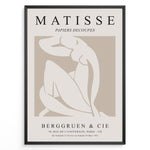 Load image into Gallery viewer, Framed Matisse Papiers Decoupés poster featuring abstract nude figure artwork in beige and white with French exhibition text.
