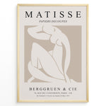 Load image into Gallery viewer, Framed Matisse Papiers Decoupés poster featuring abstract nude figure artwork in beige and white with French exhibition text.
