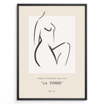 Load image into Gallery viewer, Framed La Femme poster featuring minimalist female silhouette line art in black on a beige background with modern typography.
