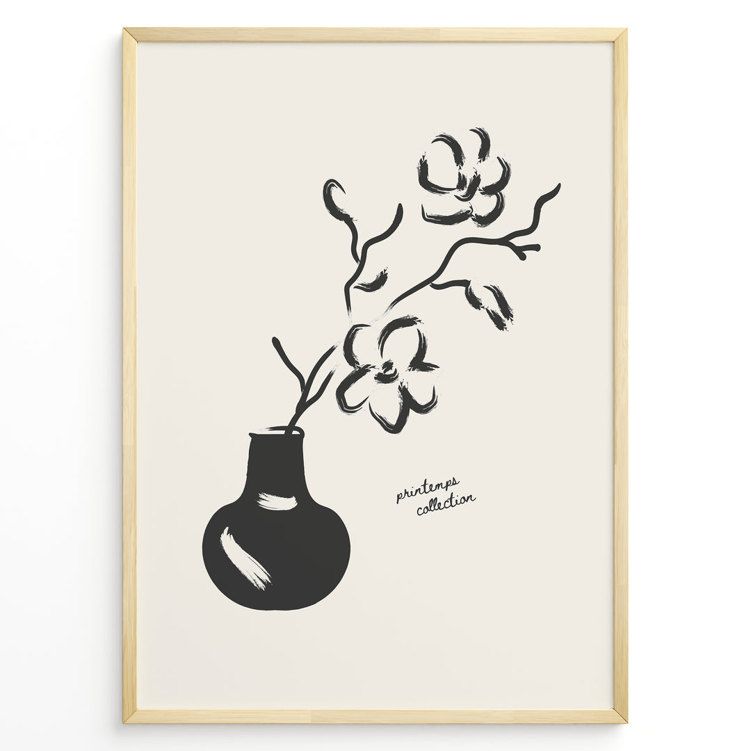 Minimalist black and white floral vase wall art print with brushstroke flowers in a modern frame.