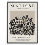 Load image into Gallery viewer, Framed Matisse Papiers Découpés poster featuring black botanical cut-out shapes on a taupe background.
