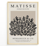 Load image into Gallery viewer, Framed Matisse Papiers Découpés poster featuring black botanical cut-out shapes on a taupe background.
