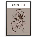 Load image into Gallery viewer, Framed “La Femme No.03” poster with minimalist brown line art of a woman holding a flower on a taupe background from the Bohemian Collection.
