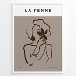 Load image into Gallery viewer, Framed “La Femme No.03” poster with minimalist brown line art of a woman holding a flower on a taupe background from the Bohemian Collection.

