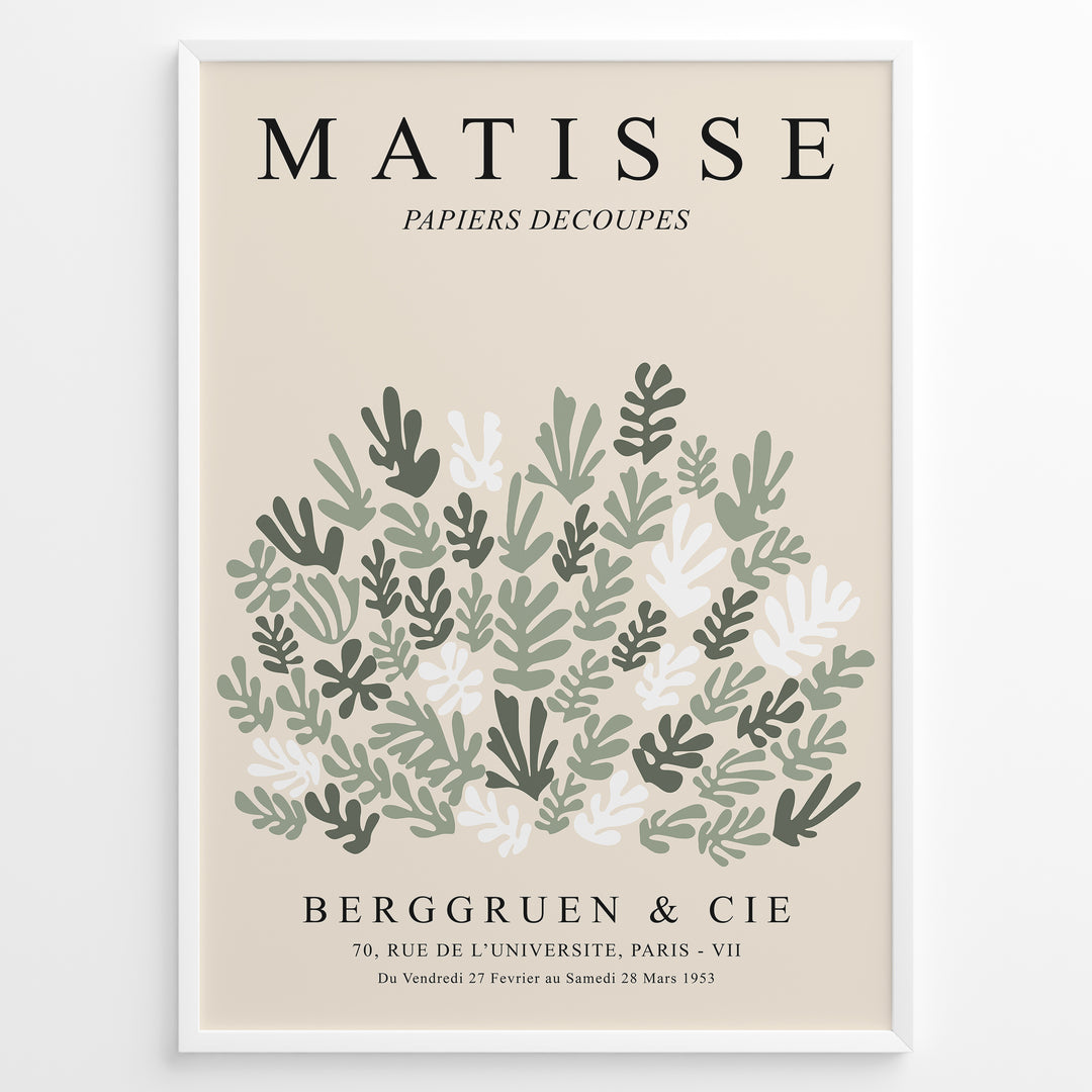 Framed Matisse-style botanical poster with abstract green and white leaf cutout shapes and beige background, titled “Papiers Découpés.”