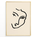 Load image into Gallery viewer, Minimal abstract face line art poster in black frame on beige background.
