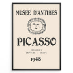 Load image into Gallery viewer, Framed Picasso Musée d’Antibes 1948 exhibition poster with a minimalist face illustration and vintage typography on a beige background.
