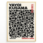 Load image into Gallery viewer, Framed Yayoi Kusama Infinity Dots art poster with black circular patterns and red Osaka 1992 text on a beige background.
