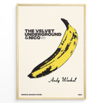 Load image into Gallery viewer, Framed Andy Warhol Banana art poster featuring The Velvet Underground &amp; Nico text on a beige background.

