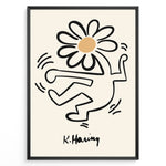 Load image into Gallery viewer, Framed Keith Haring-style poster showing a black outlined dancing figure with a daisy flower head on a beige background.
