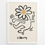 Load image into Gallery viewer, Framed Keith Haring-style poster showing a black outlined dancing figure with a daisy flower head on a beige background.
