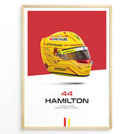 Load image into Gallery viewer, Framed poster of Lewis Hamilton’s yellow Ferrari F1 helmet with red background, featuring number 44 and Scuderia Ferrari branding.
