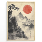 Load image into Gallery viewer, Japanske plakater | Traditional Japanese brush painting of misty mountains with pine trees on a cliff and a bold red sun, framed in black.
