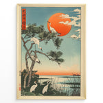 Load image into Gallery viewer, Japanske plakater |  Japanese ukiyo-e style art print of white cranes with a pine tree and a vivid red sun over a tranquil lakeside, framed in black.
