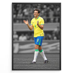 Load image into Gallery viewer, Kaká iført Brasiliens gule fodboldtrøje på en stilren sort-hvid fodboldbane.
