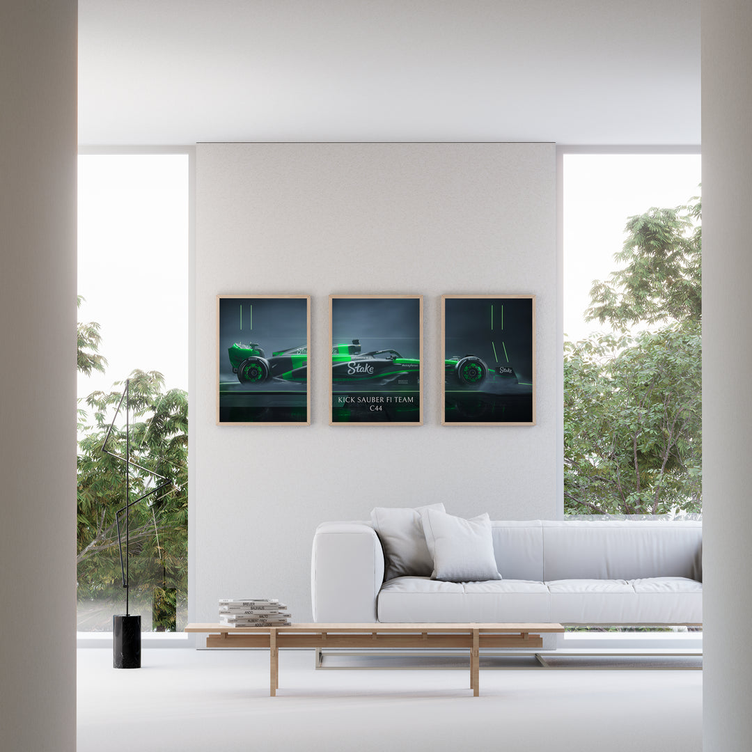 Triptych wall art plakat of the Kick Sauber F1 Team C44 Formula 1 car in a sleek black-and-green livery, displayed in a modern living room with black leather furniture.