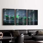 Load image into Gallery viewer, Triptych wall art plakat of the Kick Sauber F1 Team C44 Formula 1 car in a sleek black-and-green livery, displayed in a modern living room with black leather furniture.
