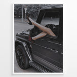 Load image into Gallery viewer, Fashion Plakat | Luxury Escape: Legs in High Heels Through Mercedes G-Wagon Window Plakaty.dk | Woman&#39;s legs in high heels sticking out of a Mercedes-Benz G-Wagon window in an urban street scene.
