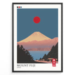 Load image into Gallery viewer, Japanske plakater | Minimalist poster of Mount Fuji at sunset with a red sun in the sky, trees and houses in the foreground, and soft pink and blue tones creating a tranquil Japanese landscape.
