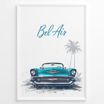 Load image into Gallery viewer, Framed poster of a turquoise Chevrolet Bel Air front view with “Bel Air” text and palm trees in the background.
