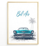 Load image into Gallery viewer, Framed poster of a turquoise Chevrolet Bel Air front view with “Bel Air” text and palm trees in the background.

