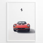 Load image into Gallery viewer, Framed minimalist poster of a red Ferrari Dino 246 GT classic sports car front view with black Ferrari prancing horse logo above.

