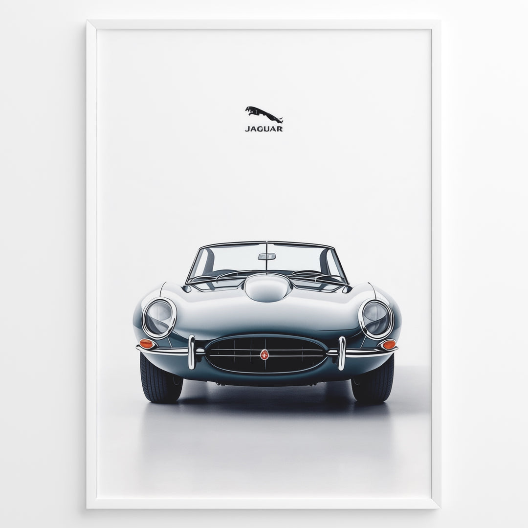 Framed minimalist poster of a silver Jaguar E-Type convertible classic car front view with Jaguar logo above on a white background.