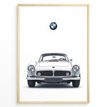 Load image into Gallery viewer, Framed minimalist poster of a white BMW 507 classic coupe front view with BMW logo above on a white background.
