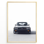 Load image into Gallery viewer, Front view illustration of a classic Toyota Celica in a framed poster.
