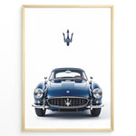 Load image into Gallery viewer, Illustration of a classic blue Maserati coupe viewed from the front with Maserati logo above.
