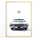 Load image into Gallery viewer, Front-facing illustration of a white classic convertible car with an emblem above in a minimalist framed poster.
