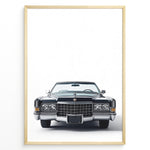 Load image into Gallery viewer, Front-facing illustration of a classic black vintage convertible car in a minimalist framed poster.
