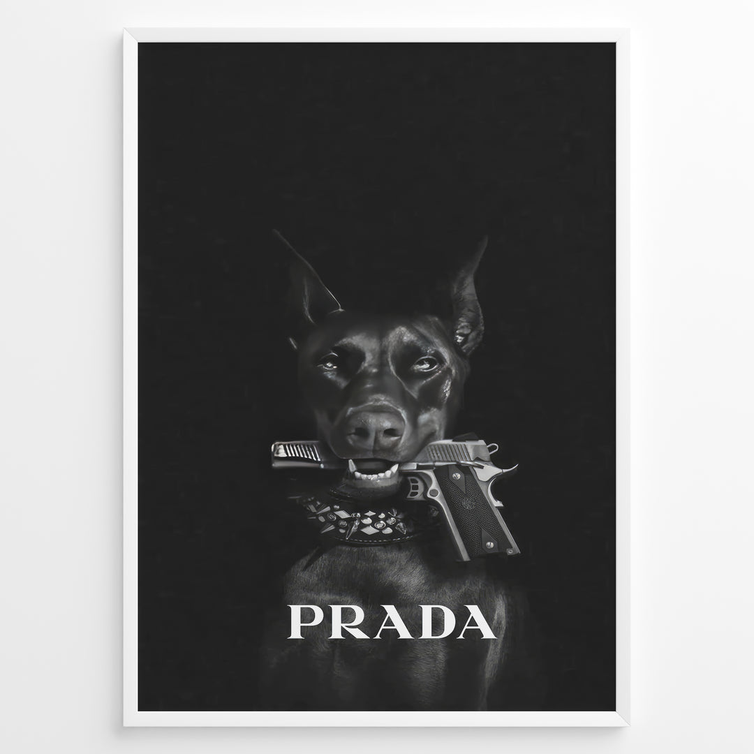 Fashion Plakat | Prada-Inspired Art Featuring Fierce Dog with Gun Plakaty.dk | Black Doberman with a studded collar holding a handgun in its mouth, set against a dark background with the word "PRADA" in bold white text.
