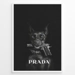 Load image into Gallery viewer, Fashion Plakat | Prada-Inspired Art Featuring Fierce Dog with Gun Plakaty.dk | Black Doberman with a studded collar holding a handgun in its mouth, set against a dark background with the word &quot;PRADA&quot; in bold white text.
