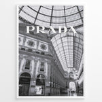 Load image into Gallery viewer, Fashion Plakat | Prada Boutique in Galleria Vittorio Emanuele II – Milan, Italy Plakaty.dk | Black and white photo of the Prada store inside the Galleria Vittorio Emanuele II in Milan, showcasing ornate architecture and a large glass-domed ceiling.
