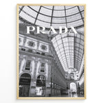 Load image into Gallery viewer, Fashion Plakat | Prada Boutique in Galleria Vittorio Emanuele II – Milan, Italy Plakaty.dk | Black and white photo of the Prada store inside the Galleria Vittorio Emanuele II in Milan, showcasing ornate architecture and a large glass-domed ceiling.

