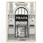 Load image into Gallery viewer, Fashion Plakat | Prada Storefront Wall Art – Italian Luxury Boutique Print Plakaty.dk | Black and white photo of the Prada Milano storefront with arched windows and detailed classical architecture.
