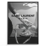 Load image into Gallery viewer, Fashion Plakat | Saint Laurent Glamour Art Featuring Glitter Phone and Elegant Hand Plakaty.dk | Black-and-white image of a sparkling vintage rotary phone being held by a glittering, elegant hand, with &quot;SAINT LAURENT PARIS&quot; overlaid in bold text.
