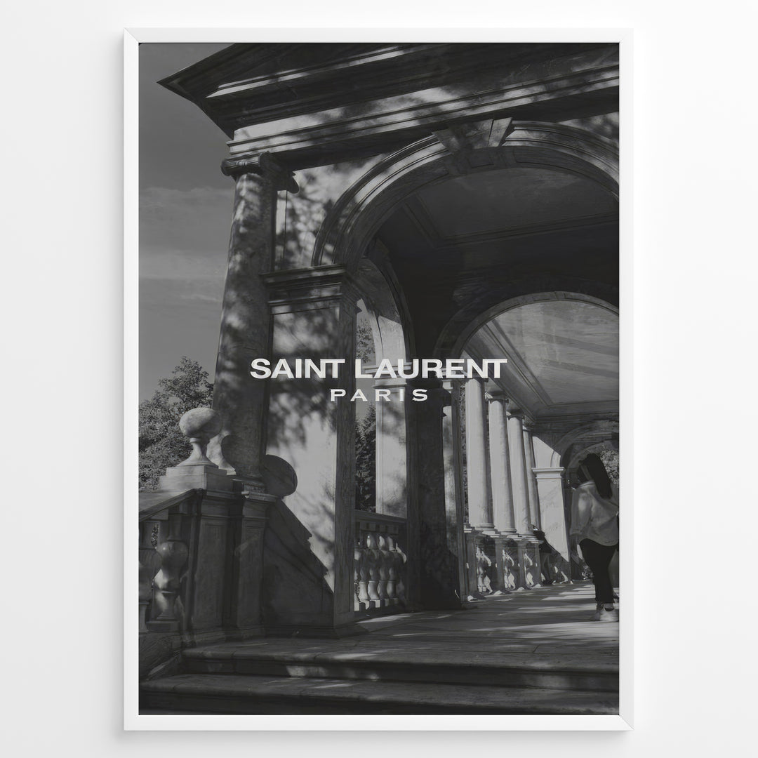 Fashion Plakat | Saint Laurent Paris – Architectural Elegance in Monochrome Plakaty.dk | Black and white photo of classical architecture with arches and columns, overlaid with the Saint Laurent Paris logo, conveying elegance and luxury.
