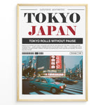 Load image into Gallery viewer, Japanske plakater | Blurred motion photograph of cars crossing a busy intersection in Tokyo at dusk, with bright neon signs and tall buildings in the background, framed by a poster layout with the text &quot;TOKYO JAPAN&quot; and a description of Tokyo’s city life.
