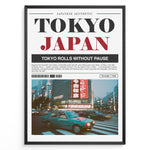 Load image into Gallery viewer, Japanske plakater | Blurred motion photograph of cars crossing a busy intersection in Tokyo at dusk, with bright neon signs and tall buildings in the background, framed by a poster layout with the text &quot;TOKYO JAPAN&quot; and a description of Tokyo’s city life.
