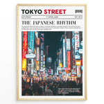Load image into Gallery viewer, Japanske plakater | Poster styled like a newspaper cover showing a crowded Tokyo street at night, with glowing neon signs in Japanese and a headline reading &quot;The Japanese Rhythm.&quot;
