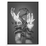 Load image into Gallery viewer, Fashion Plakat | Versace-Inspired Art Featuring Serpent and Marble Hands Plakaty.dk | Black-and-white image of a snake wrapped around two upward-reaching marble-textured hands, with the word &quot;VERSACE&quot; overlaid in bold, semi-blurred text.
