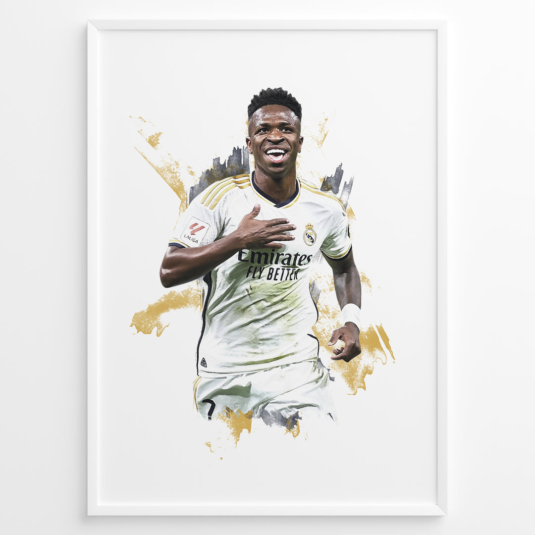 Framed watercolor-style plakat of Vinícius Jr. celebrating in a Real Madrid jersey with a gold artistic background