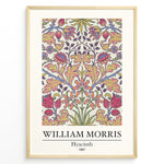 Load image into Gallery viewer, Framed William Morris Hyacinth 1887 floral art print plakat with colorful symmetrical flower and leaf design on a light background.
