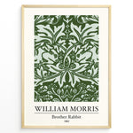 Load image into Gallery viewer, Framed William Morris Brother Rabbit 1882 art print plakat with detailed green foliage and rabbit pattern on a pale background.
